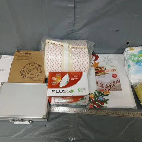 BOX OF APPROXIMATELY 12 ASSORTED ITEMS TO INCLUDE - CAKE PRESS, PAMPERS AQUA WIPES, AND CHRISTMAS TABLECLOTH ETC.