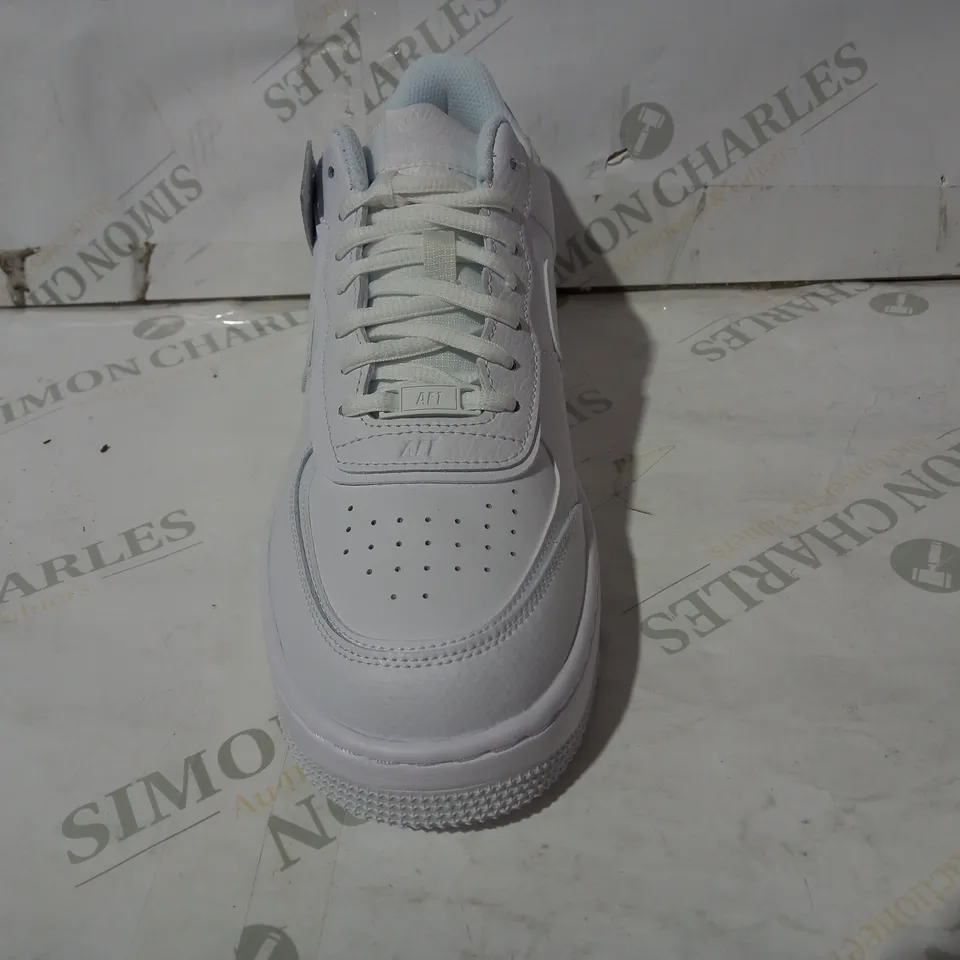 BOXED PAIR OF DESIGNER TRAINERS IN THE STYLE OF NIKE AIR FORCE 1 IN WHITE UK SIZE 9