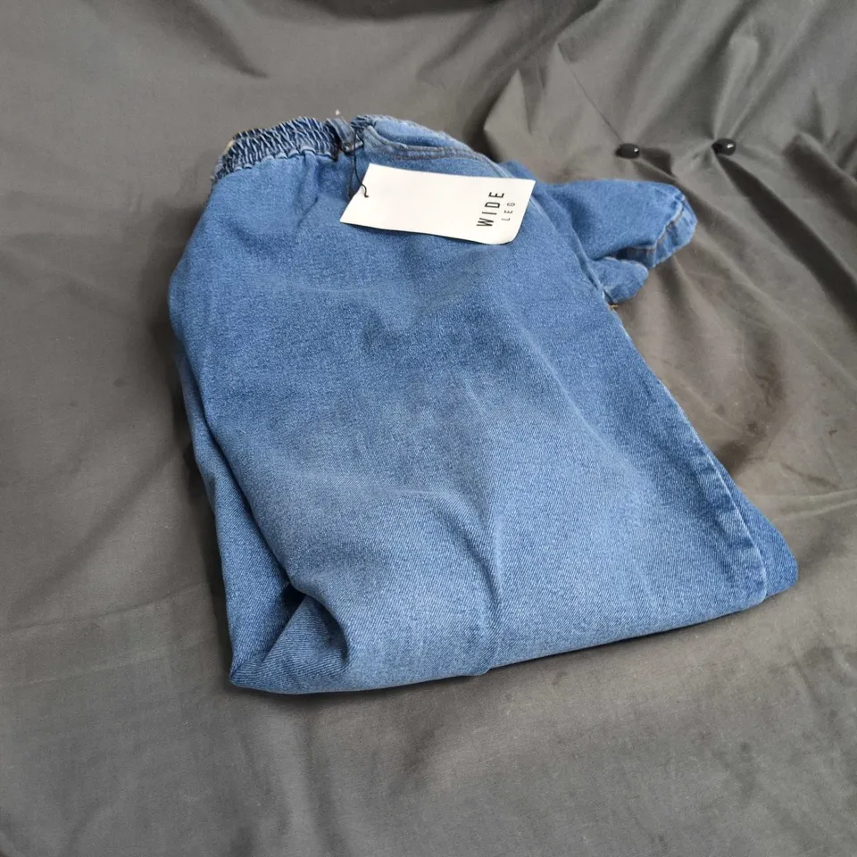 BOX OF APPROXIMATELY 20 ASSORTED CLOTHING ITEMS INCLUDING PADDED COAT , SWEET KNICKERS AND WIDE LEGGED JEANS