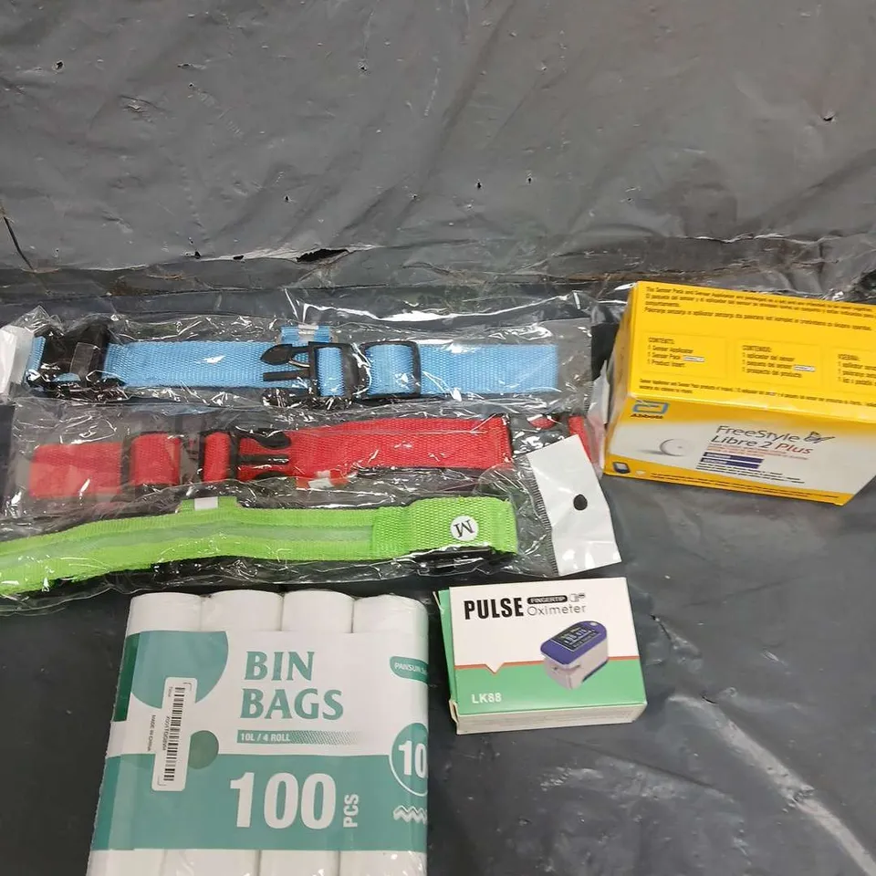 TOTE OF APPROXIMATELY 15 HOUSEHOLD ITEMS TO INCLUDE - FREESTYLE LIBRE STRIPS - PULSE OXIMETER - STRAPS
