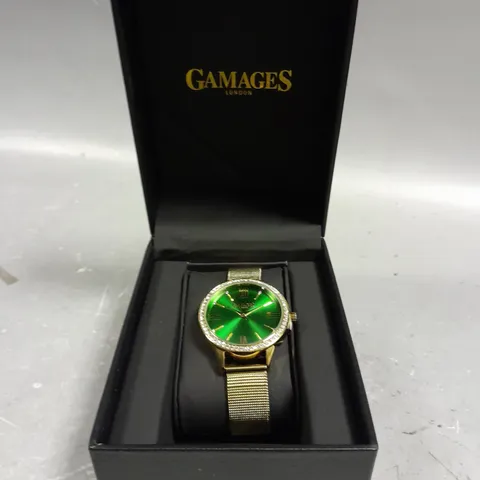 GAMAGES MIDNIGHT CRYSTAL GOLD GREEN DIAL WATCH