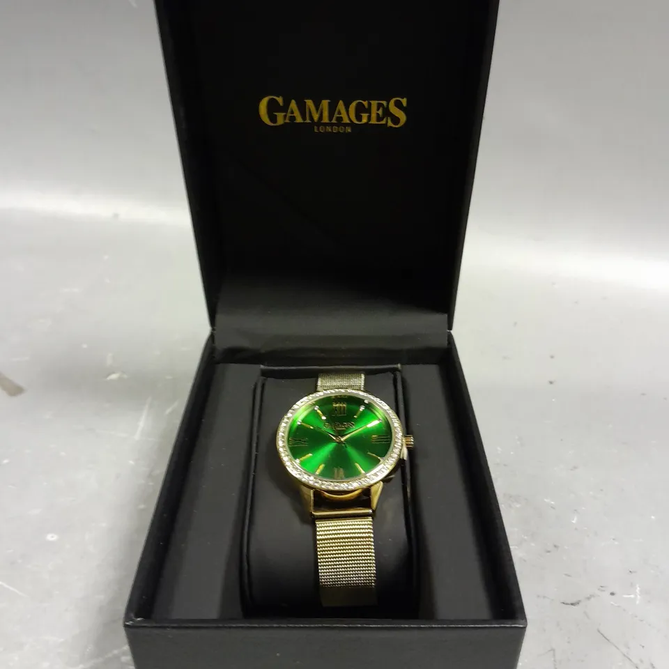 GAMAGES MIDNIGHT CRYSTAL GOLD GREEN DIAL WATCH 