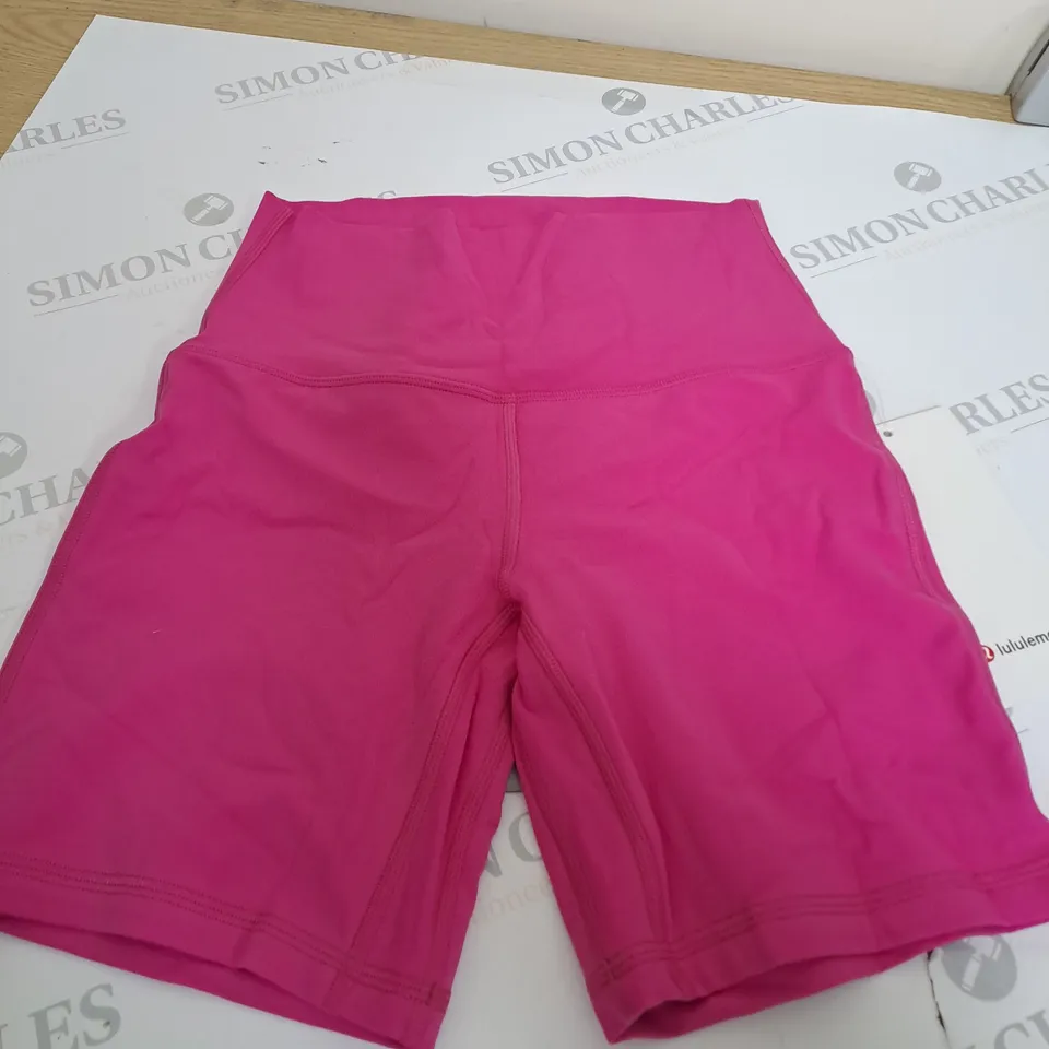 LULUMELON PINK GYM SHORTS SIZE 4