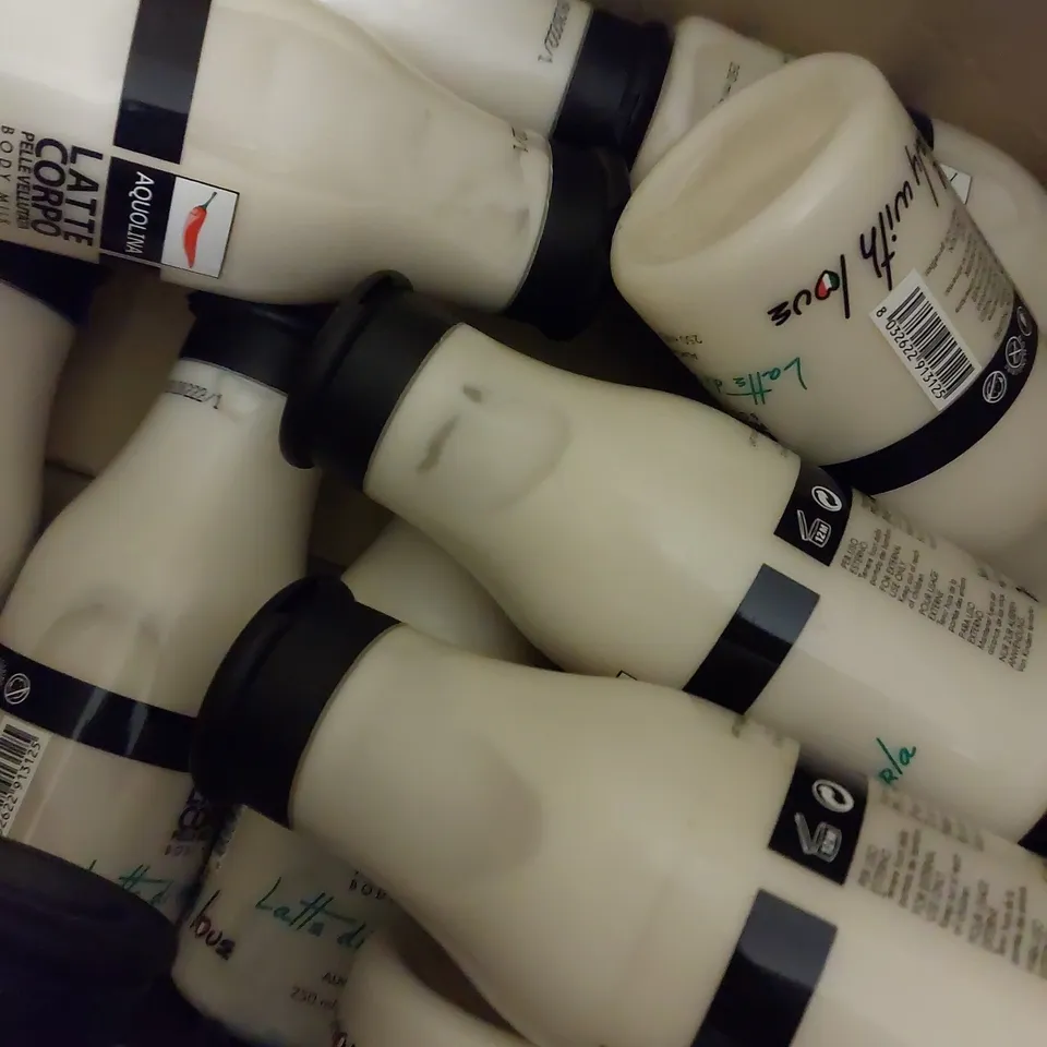 LOT OF APPROX 12 X 250ML AQUOLINA ALMOND MILK BODY MILK