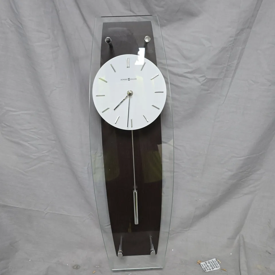 HOWARD MILLER WALL CLOCK – GLASS & DARK WOOD CASE WITH PENDULUM