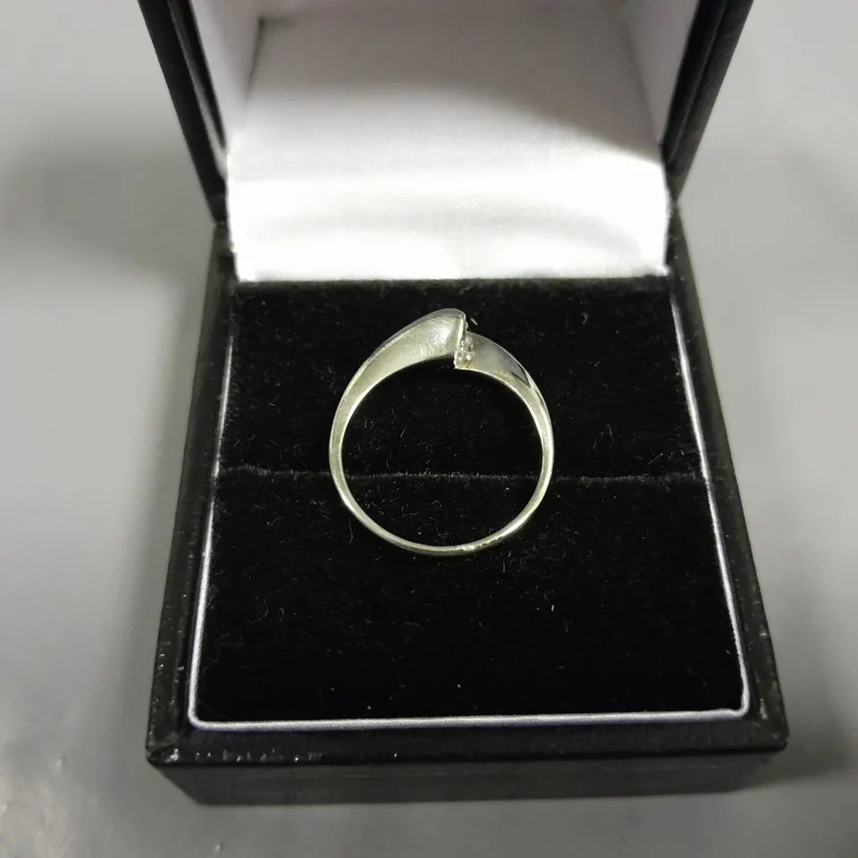 18CT WHITE GOLD NATURAL DIAMOND SOLITAIRE TWIST RING
