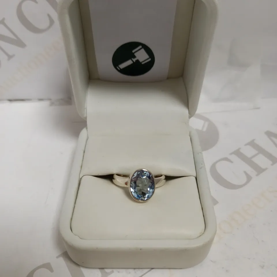 SILVER BAND RING WITH BLUE STONE