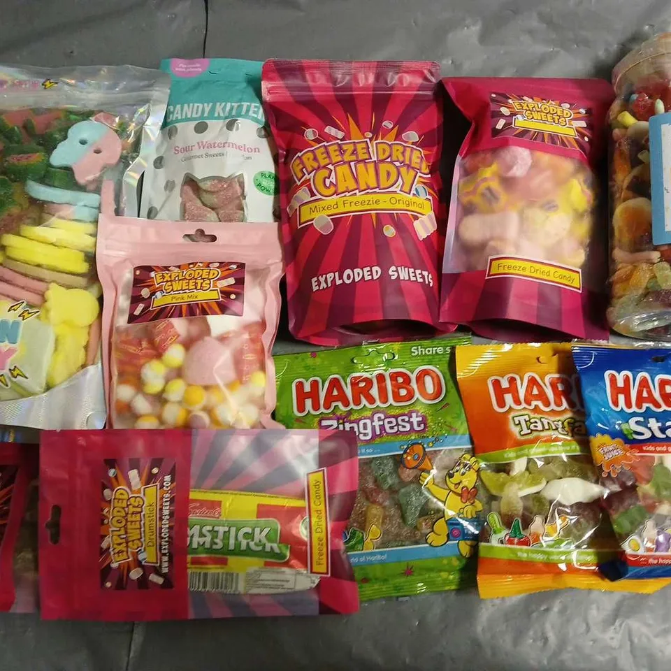 LOT OF 11 ASSORTED PACKS OF SWEETS TO INCLUDE CANDY KITTEN AND HARIBO