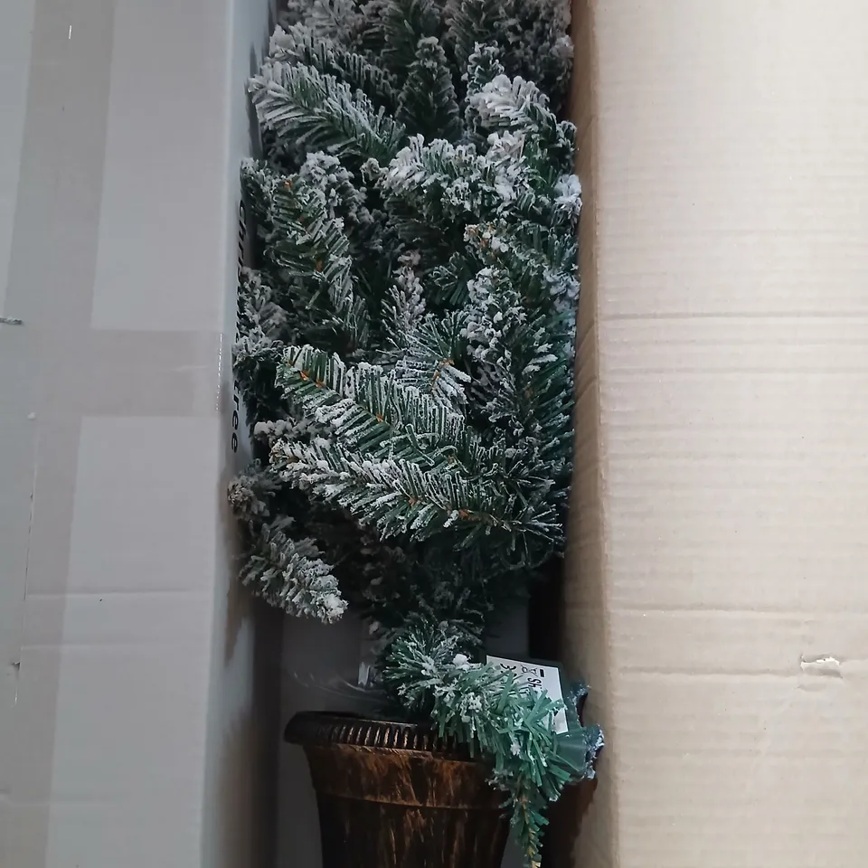 FOUR BOXED CHRISTMAS TREES