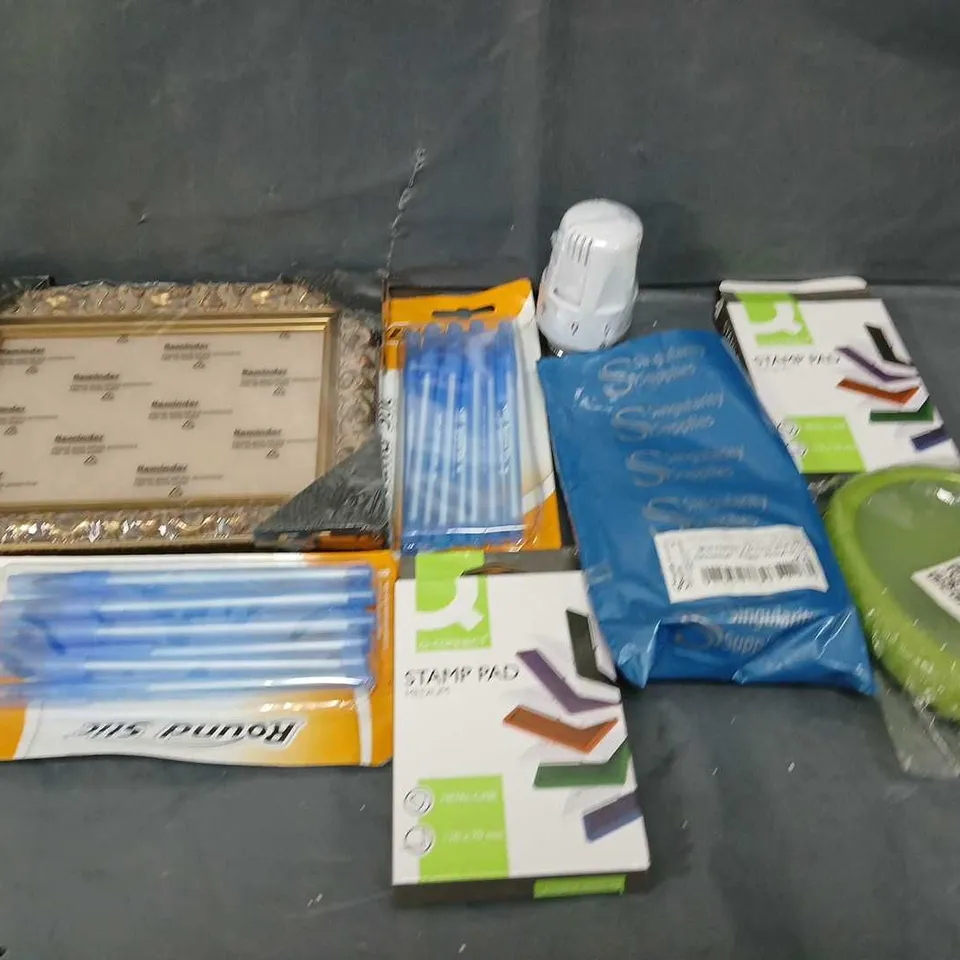 TOTE OF ASSORTED HOUSEHOLD ITEMS TO INCLUDE BIC PENS, FRAMES AND STAMP PAD