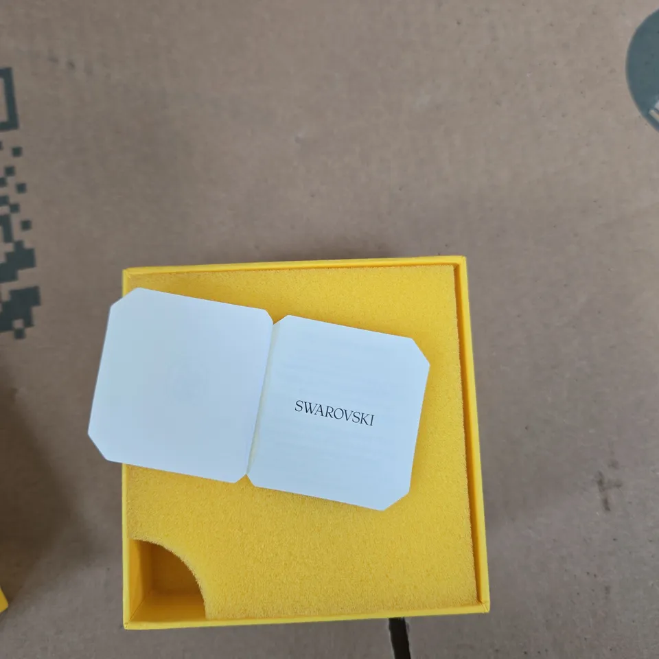 SWAROVSKI CRYSTAL BEAR ORNAMENT WITH FLOWER – BOXED