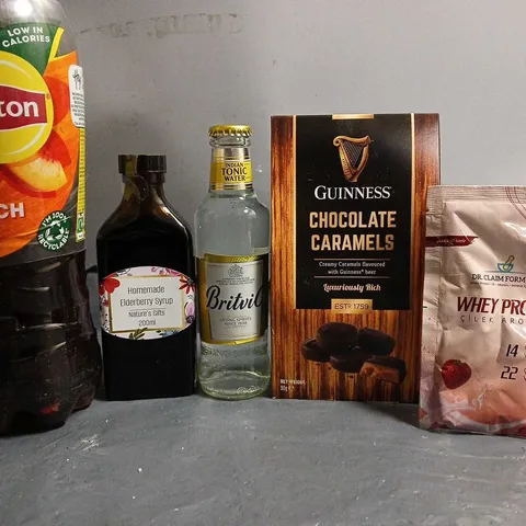 TOTE OF APPROX 10 ASSORTED FOOD ITEMS TO INCLUDE - LIPTON PEACH ICE TEA , GUINESS CHOCOLATE CARAMELS , ELDERBERRY SYRUP ETC