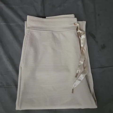 DKNY PANTS IN OATMEAL SIZE LARGE