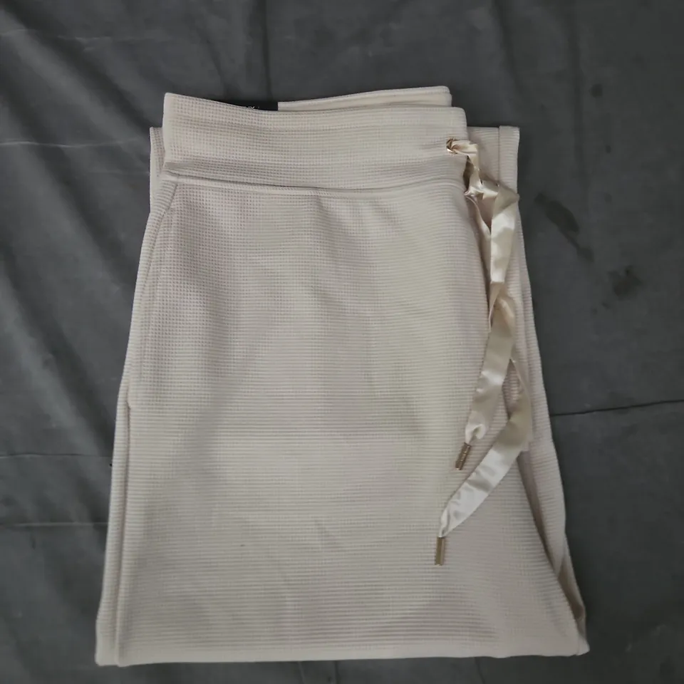DKNY PANTS IN OATMEAL SIZE LARGE