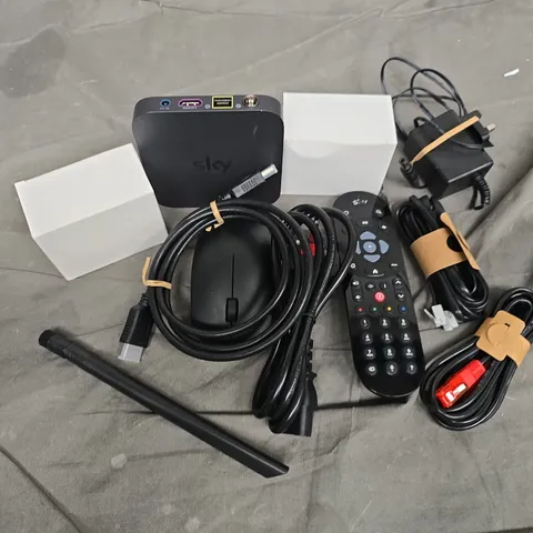 APPROXIMATELY 12 ASSORTED HOUSEHOLD ITEMS TO INCLUDE ROUTERS, REMOTES, CABLES, ETC 