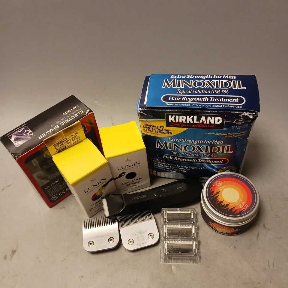BOX OF APPROXIMATELY 6 COSMETIC ITEMS TO INCLUDE - KIRKLAND MINOXIDIL HAIR REGROWTH TREATMENT - LUMIN DARK CIRCLE DEFENSE - MANSCAPED ELECTRIC SHAVER - ETC