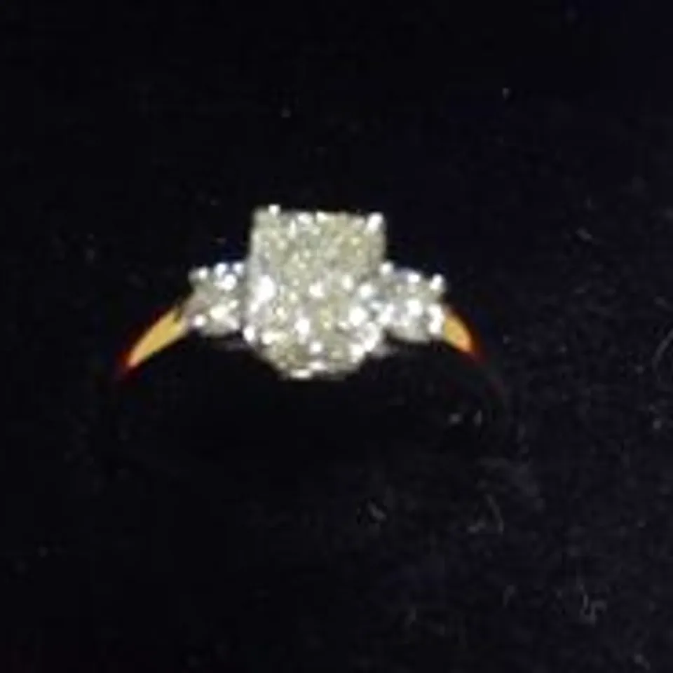 18CT GOLD RING SET WITH A NATURAL RADIANT CUT DIAMOND AND A NATURAL DIAMOND TO EACH SHOULDER, WEIGHING +1.50CT