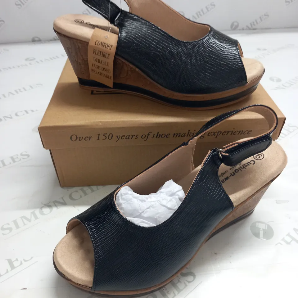 BOXED PAIR OF CUSHION WALK BLACK STRAPPY WEDGE HEELED SHOES - SIZE 6