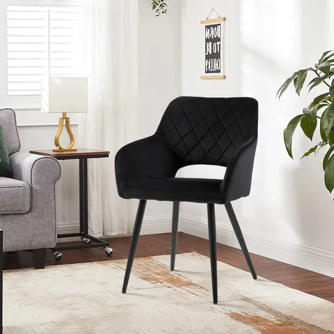 A BOXED PAIR OF BLACK VELVET UPHOLSTERED OPEN BACK DINING ROOM CHAIRS