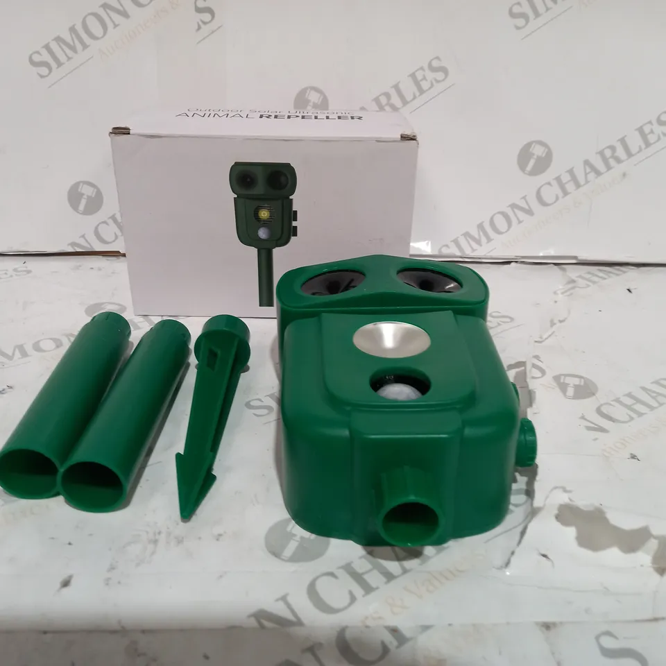 BOXED GREEN OUTDOOR SOLAR ULTRASOUND ANIMAL REPELLER
