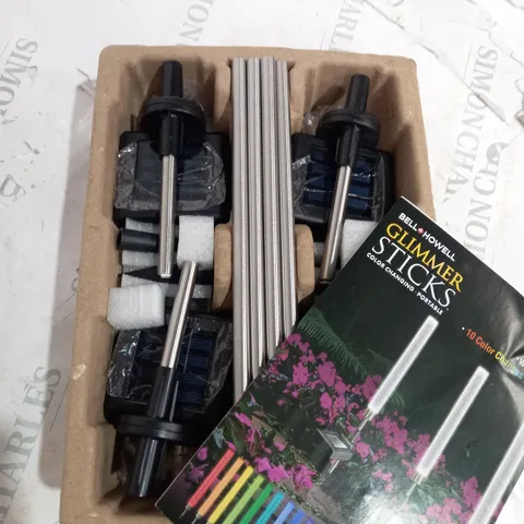 BOXED BELL & HOWELL GLIMMER STICKS SET OF 4 SOLAR PATHWAY LIGHTS