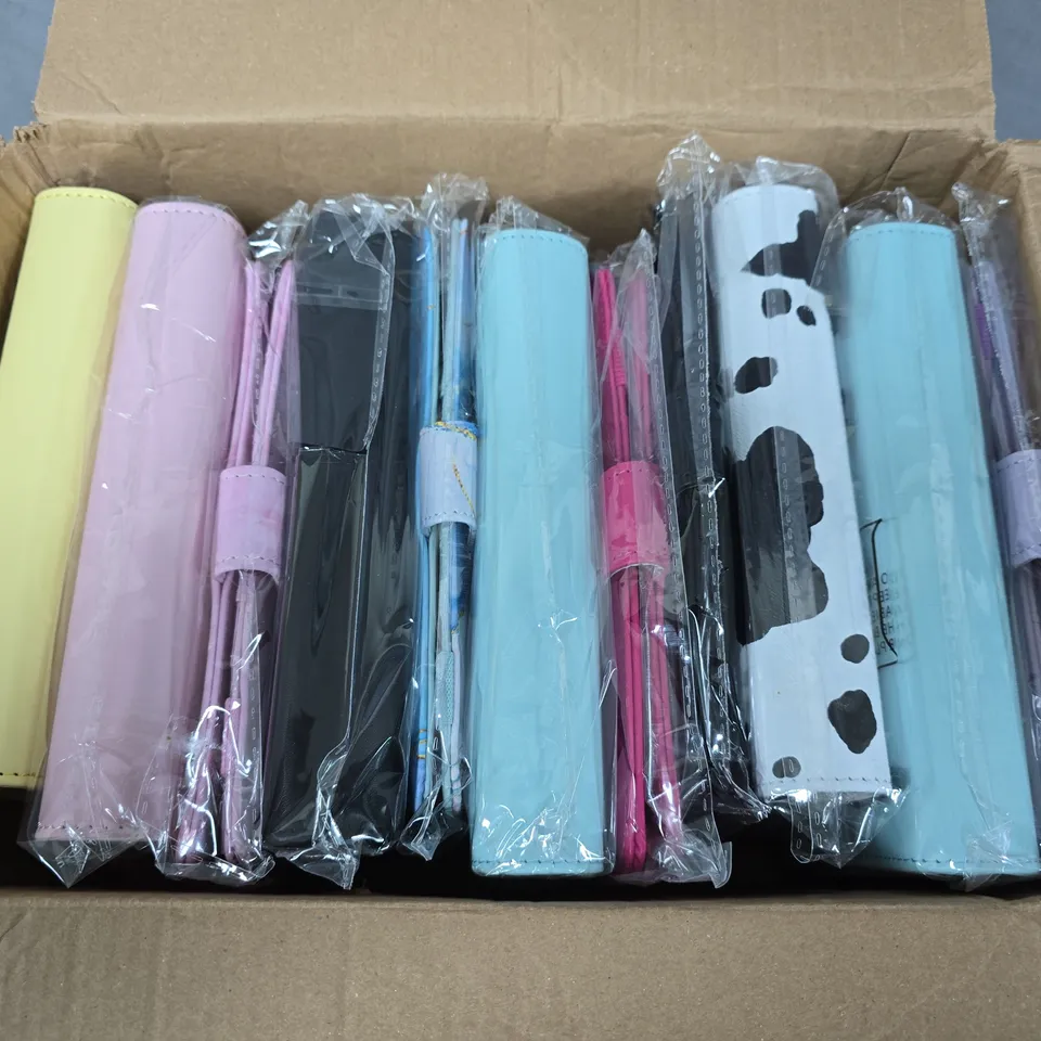 APPROXIMATELY 10 A5 BINDERS IN VARIOUS DESIGNS 