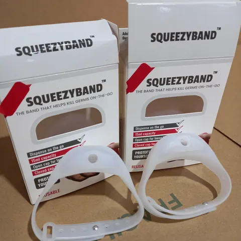 LOT OF 2 SQUEEZYBAND PORTABLE HAND SANITIZER DISPENSERS