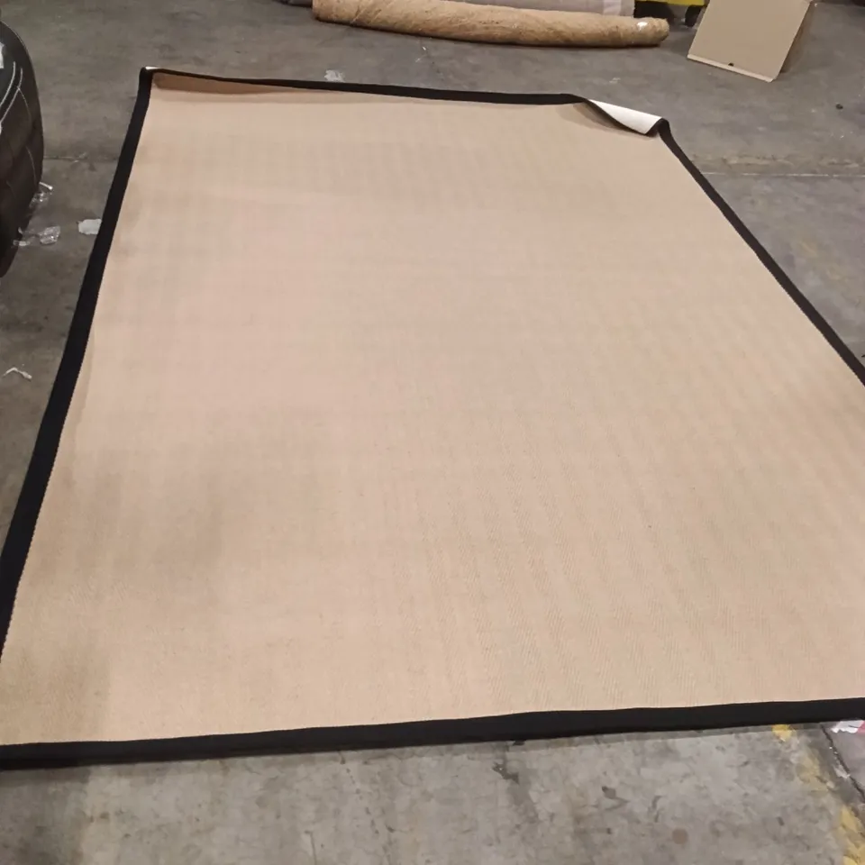 STILLAGE OF DESIGNER RUGS APPROXIMATELY 14 LARGE RUGS