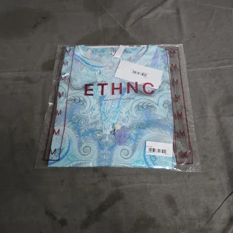 ETHNC Scarf in turquoise paisley pattern – brand label on packaging