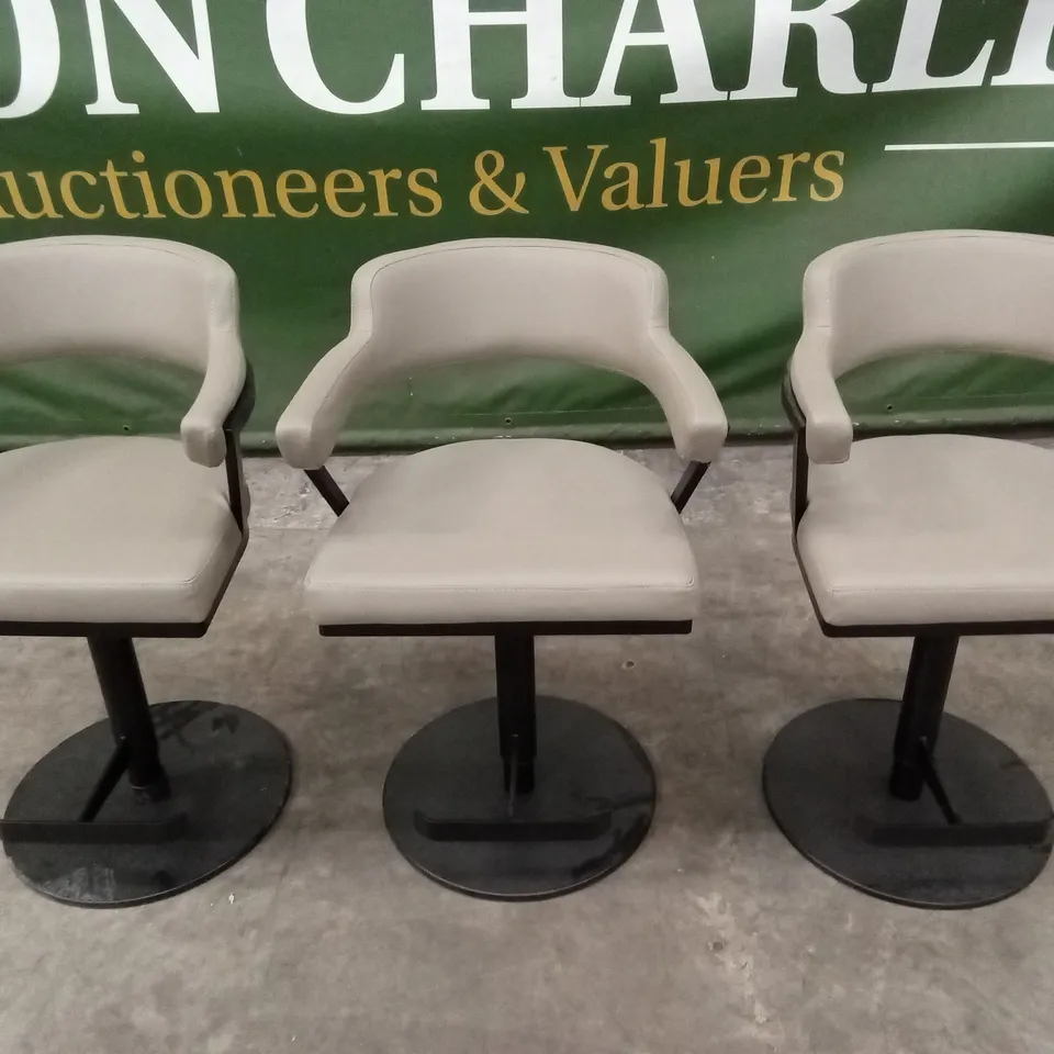 SET OF 3 FIRENZA BAR STOOLS IN TAUPE PU LEATHER AND BLACK STEEL BASE