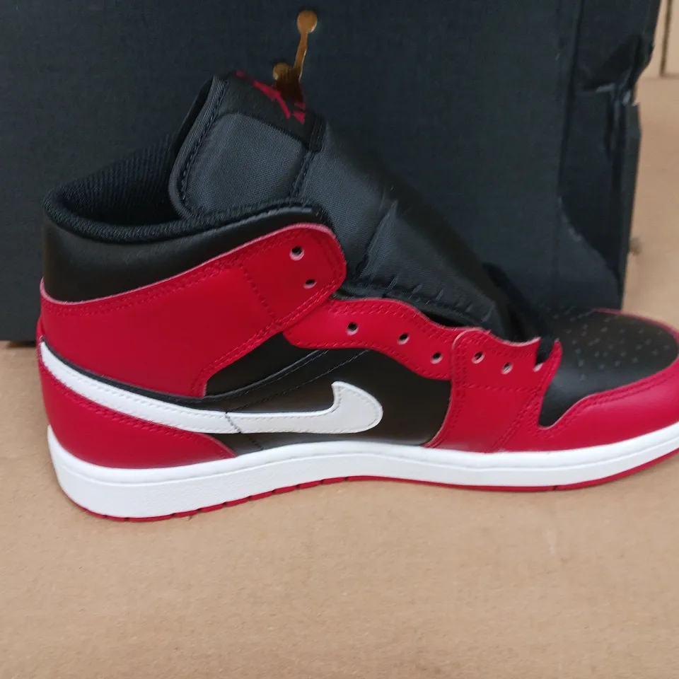 BOXED PAIR OF AIR JORDAN 1 MID TRAINERS IN RED/BLACK/WHITE - UK 8.5