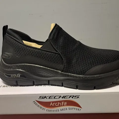 BOXED SKECHERS BLACK SLIP ON TRAINERS - UK 10