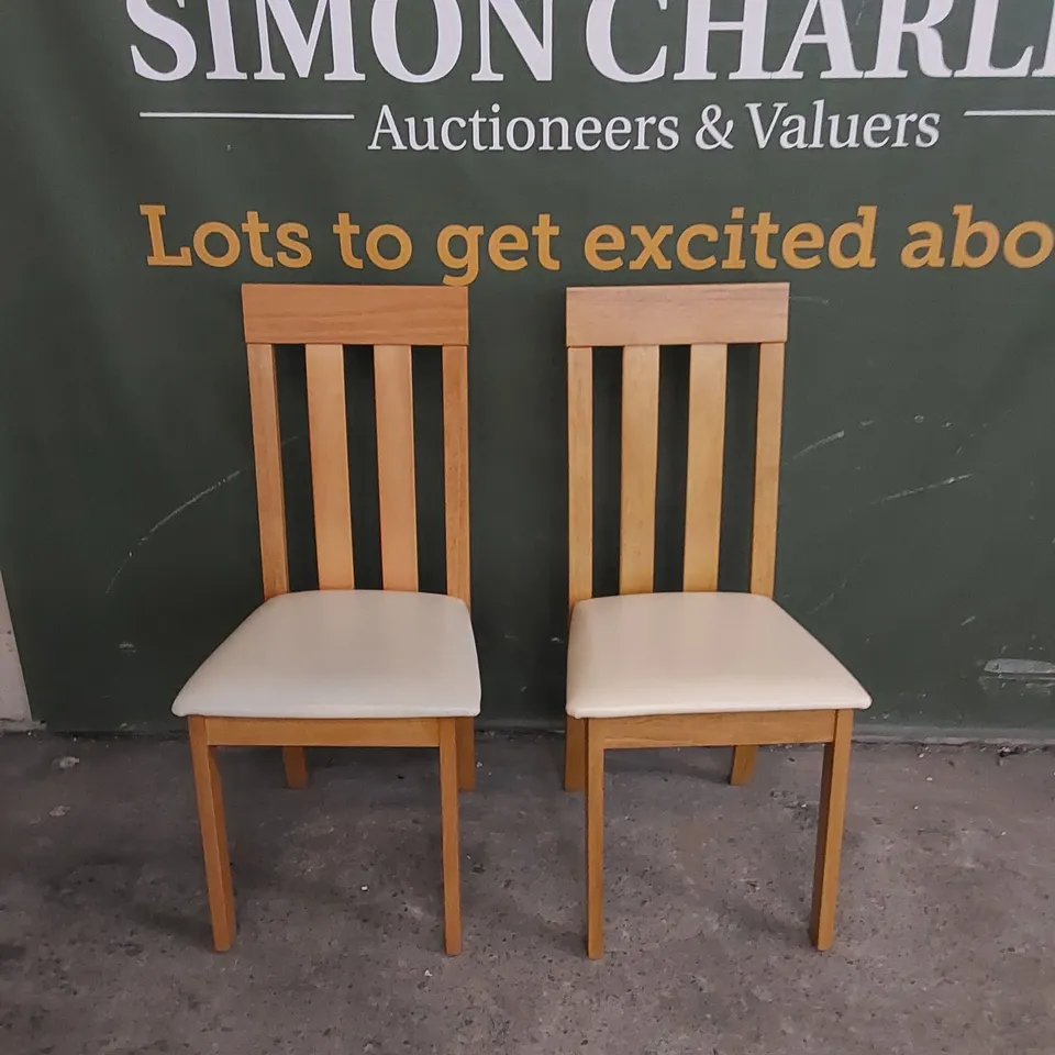 SET OF 2 CHESTER OAK DINING CHAIRS WITH IVORY LEATHER SEAT PADS 