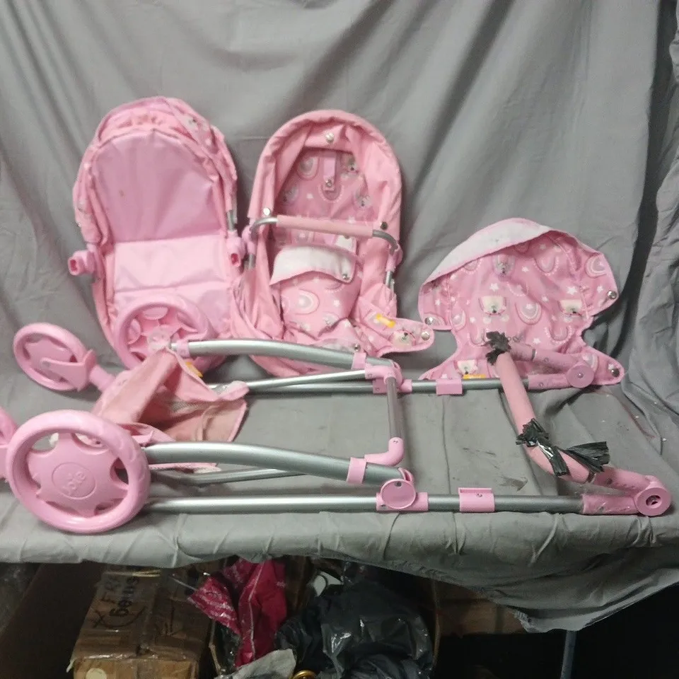 PINK DOLL’S PUSHCHAIR SET (TOY) – DISASSEMBLED FRAME WITH FABRIC SEATS.