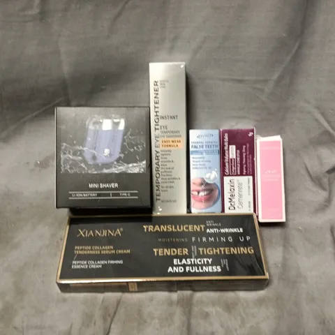 APPROXIMATELY 20 ASSORTED COSMETICS ITEMS TO INCLUDE TEMPORARY EYE TIGHTENER, MINI SHAVER, XI NJINA SERUM CREAM, ETC