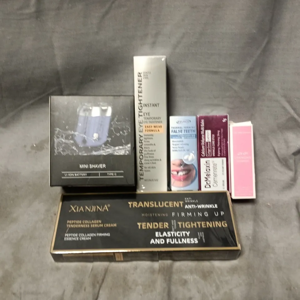 APPROXIMATELY 20 ASSORTED COSMETICS ITEMS TO INCLUDE TEMPORARY EYE TIGHTENER, MINI SHAVER, XI NJINA SERUM CREAM, ETC