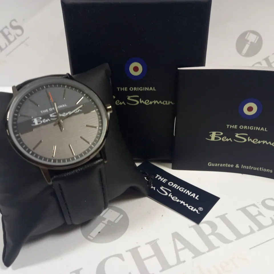 BOXED BEN SHERMAN STAINLESS STEEL BACK WATCH WITH BLACK LEATHER STRAP