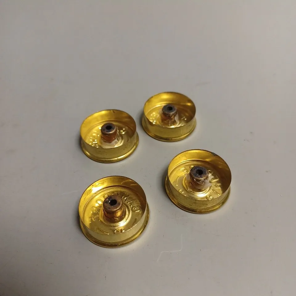 LARGE QUANTITY OF SHOTGUN SHELL HEADS STAMPED GAMEBORE 12