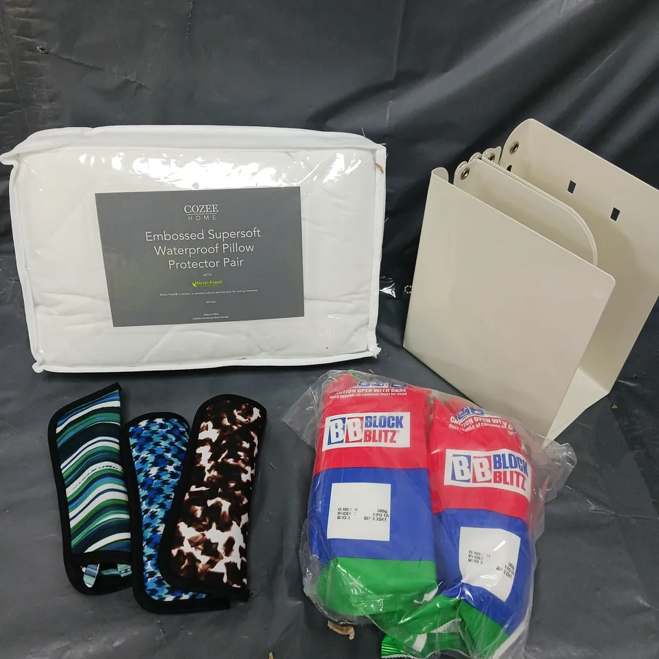 APPROXIMATELY 10 ASSORTED HOUSEHOLD PRODUCTS TO INCLUDE READING GLASSES, PILLOW PROTECTORS, BOOK ENDS ETC