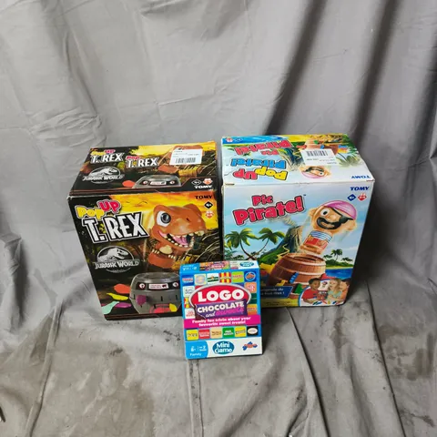 BOX OF APPROXIMATELY 12 ASSORTED HOUSEHOLD ITEMS TO INCLUDE PIC PIRATE GAME, POP UP T REX GAME, LOGO MINI GAME ETC