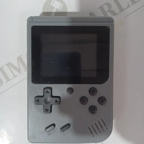 BOXED GAME BOX PLUS HANDHELD GAMING DEVICE IN GREY