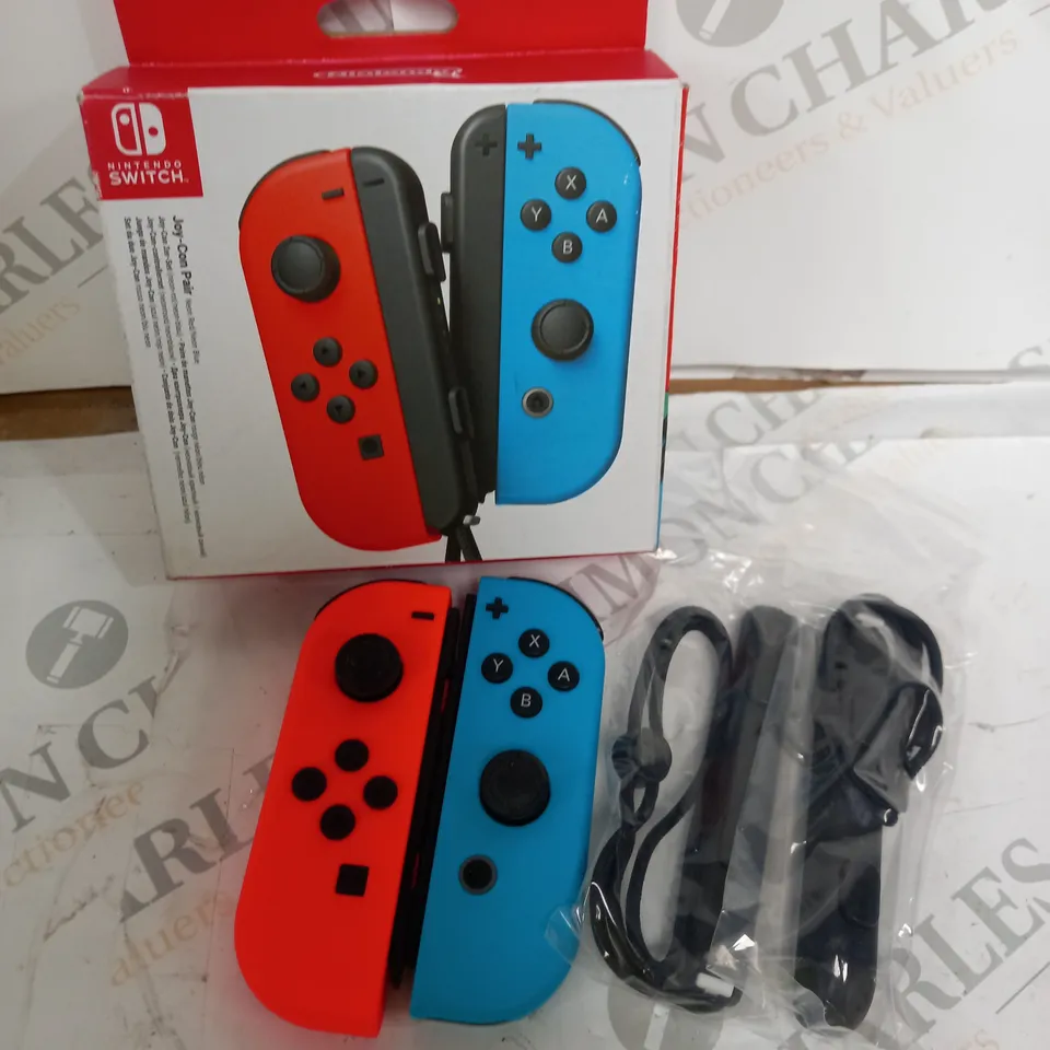 NINTENDO SWITCH JOY CON PAIR OF CONTROLLERS - BLUE AND RED 
