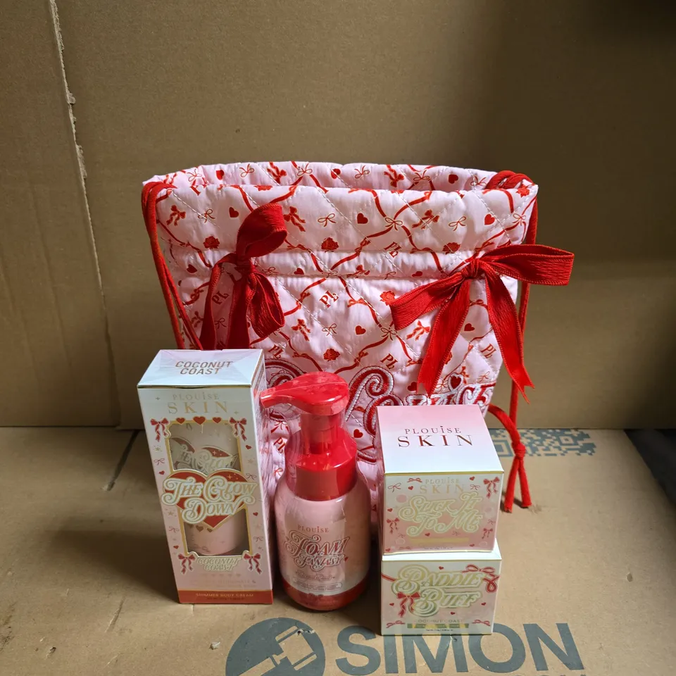 PLOUISE DRAWSTRING COSMETICS BAG TO INCLUDE SHIMMER BODY CREAM, SHIMMER MELTING BODY BALM AND FOAMING BODY WASH
