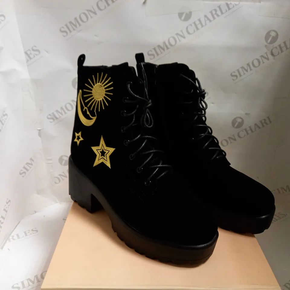 KOI VEGAN BLACK ASTRO STAR AND MOON CHUNKY BOOTS - SIZE 8