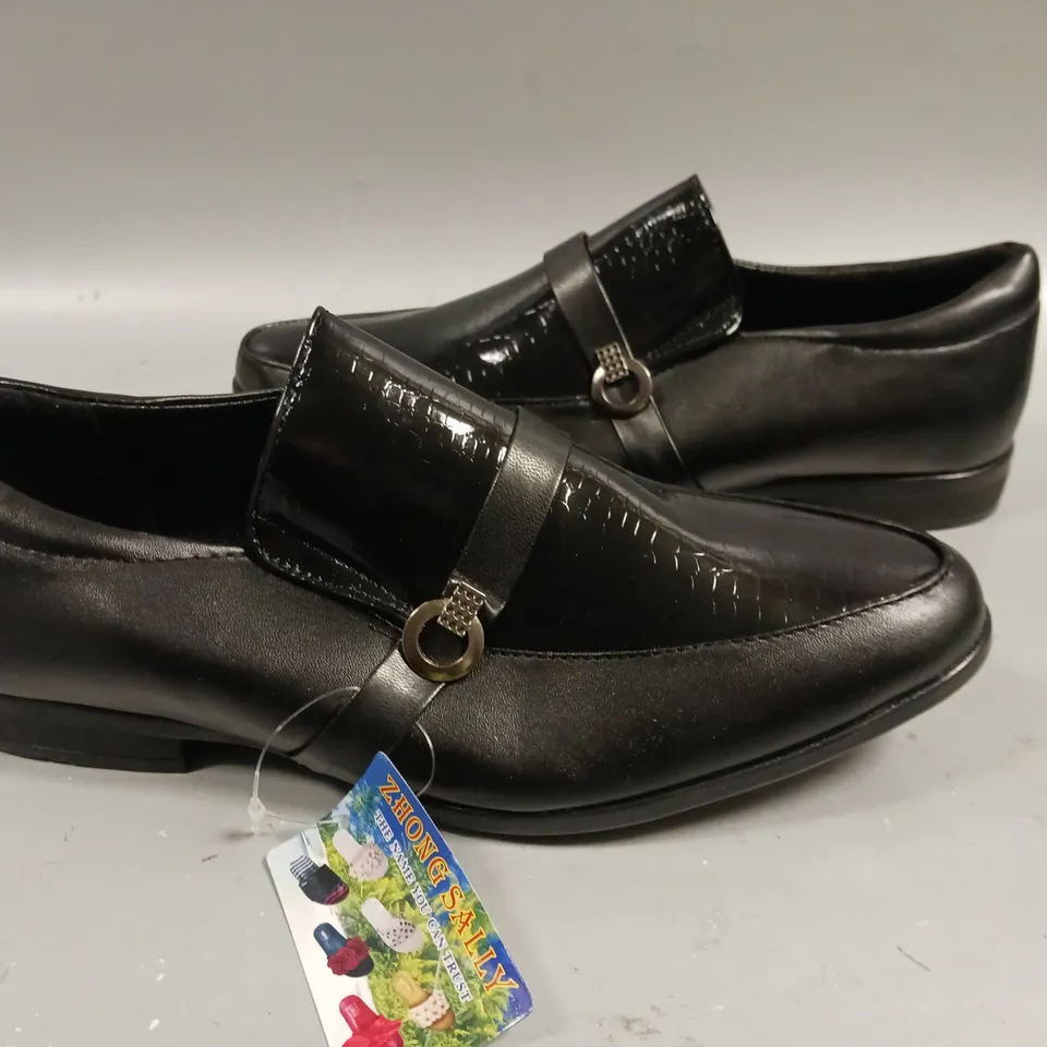 LOT OF 9 BOXED PAIRS SALLY ZHONG BLACK SHOES - VARIOUS SIZES