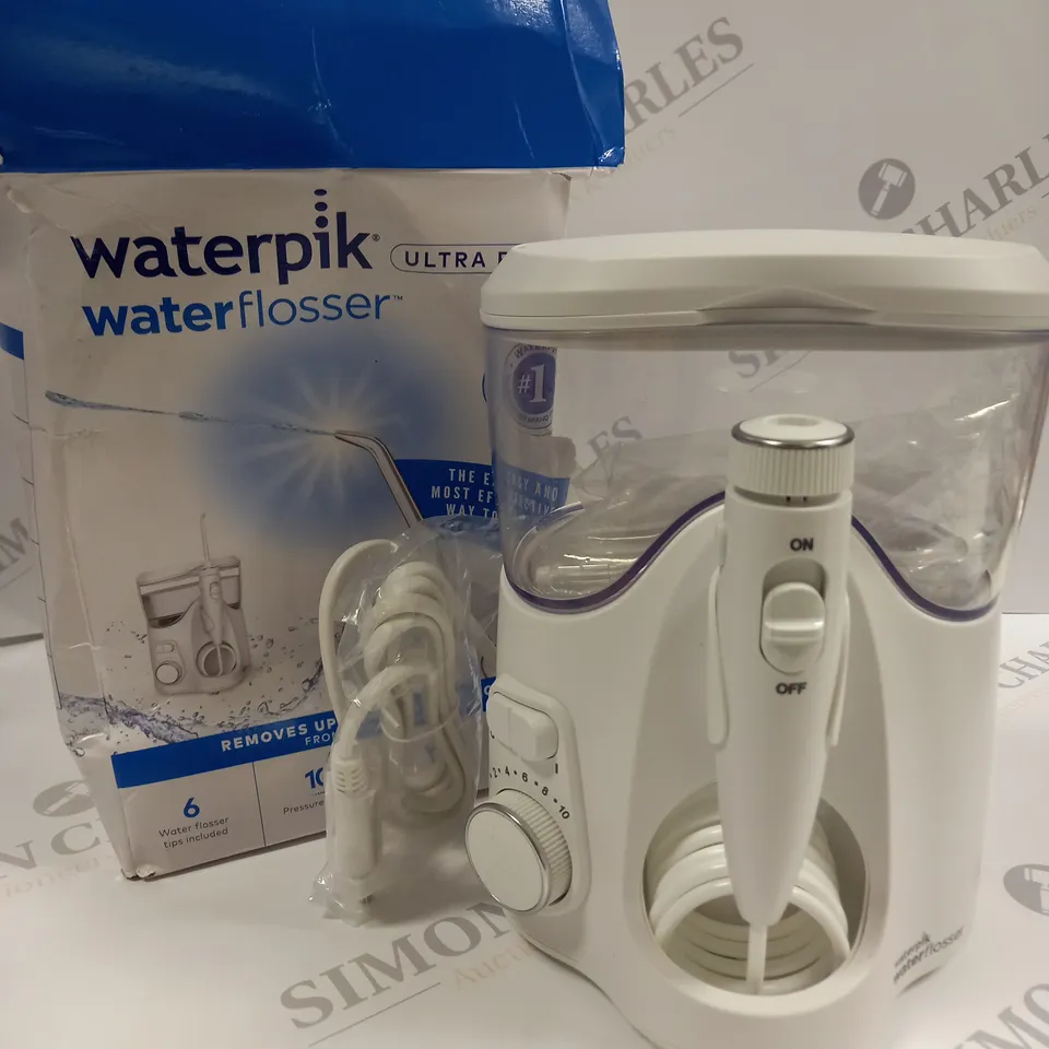 BOXED WATERPIK ULTRA PLUS WATER FLOSSER 