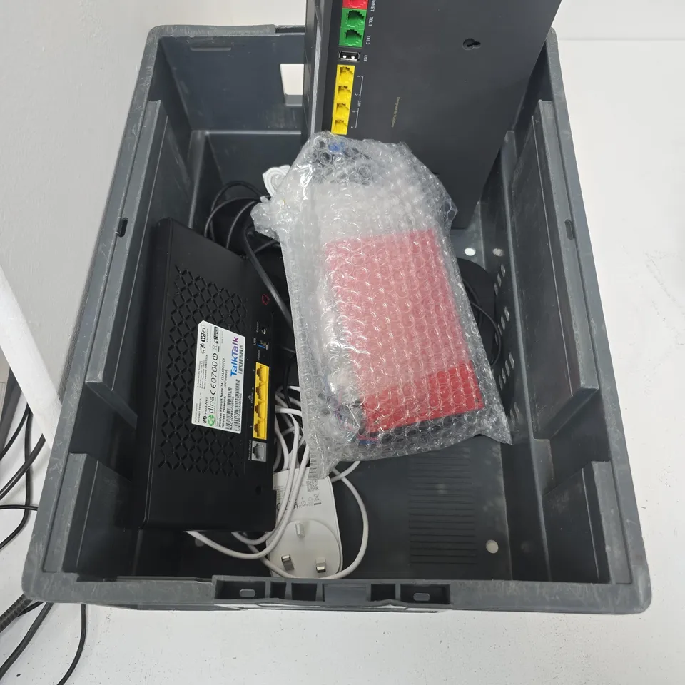 TOTE OF APPROXIMATELY 5 WIFI HUBS/ELECTRICAL EQUIPMENT.