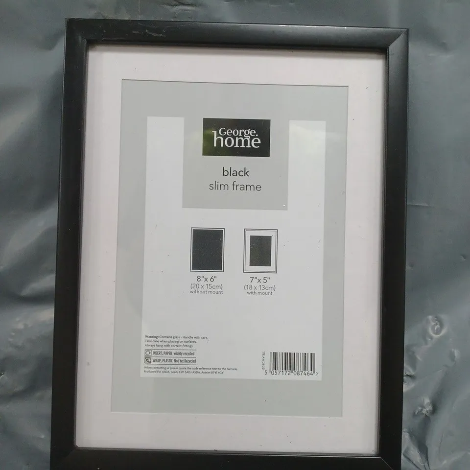 BOX OF APPROXIMATELY 35 SLIM BLACK PHOTO FRAMES