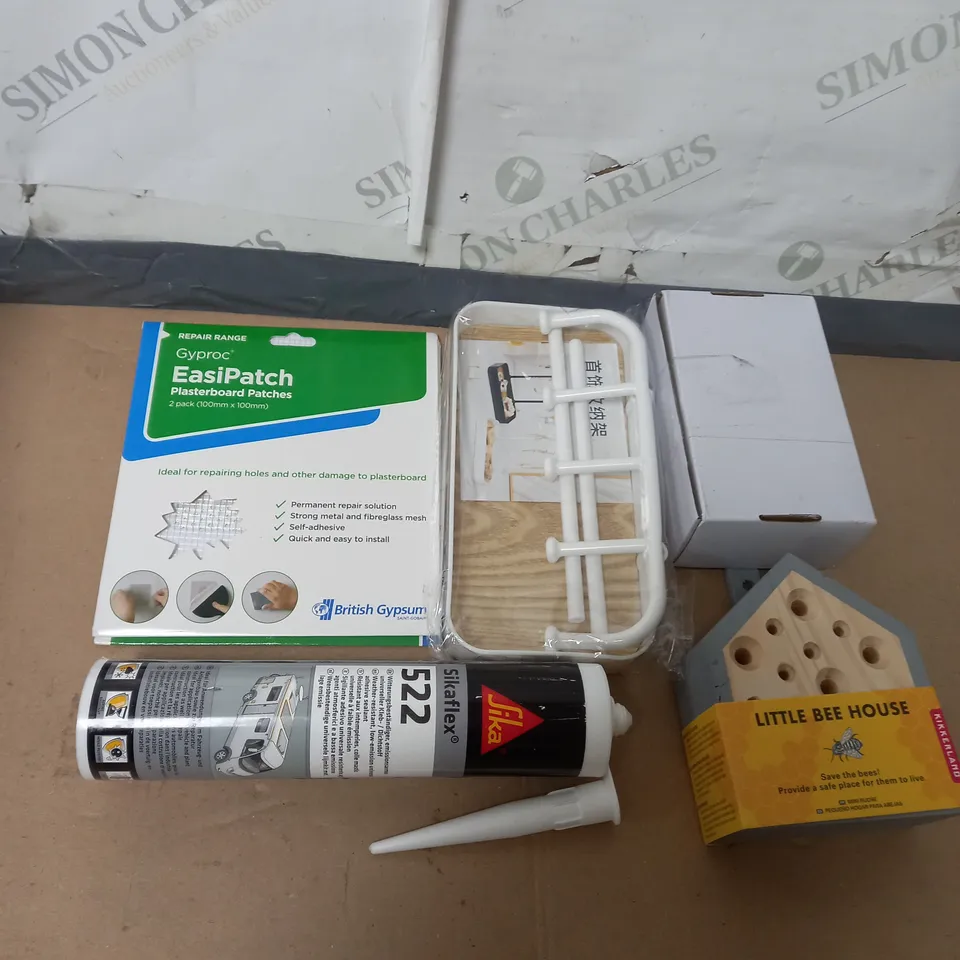TOTE OF APPROX 10 HOUSEHOLD ITEMS TOO INCLUDE OFFICE EQUIPMENT , SILICONE , PLASTERBOARD PATCHES 