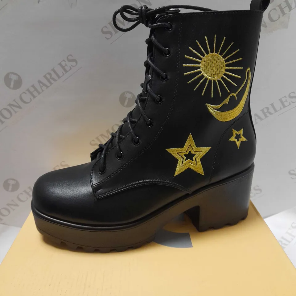 KOI ASTRO STAR AND MOON CHUNKY BLACK PU/GOLD BOOTS - SIZE 7